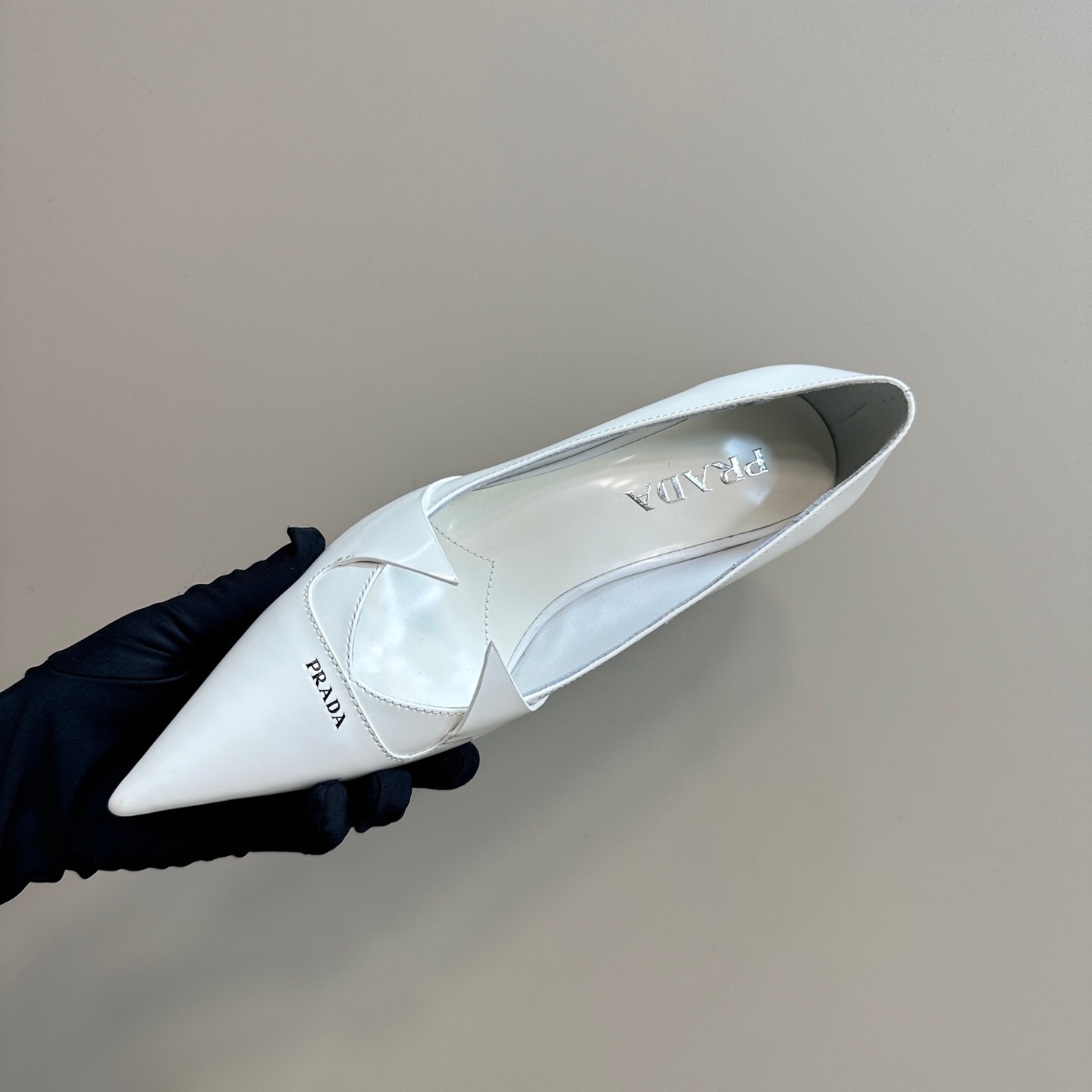 2025 Women Prada White Leather Pointed Toe Kitten Heel Pumps KFY00310