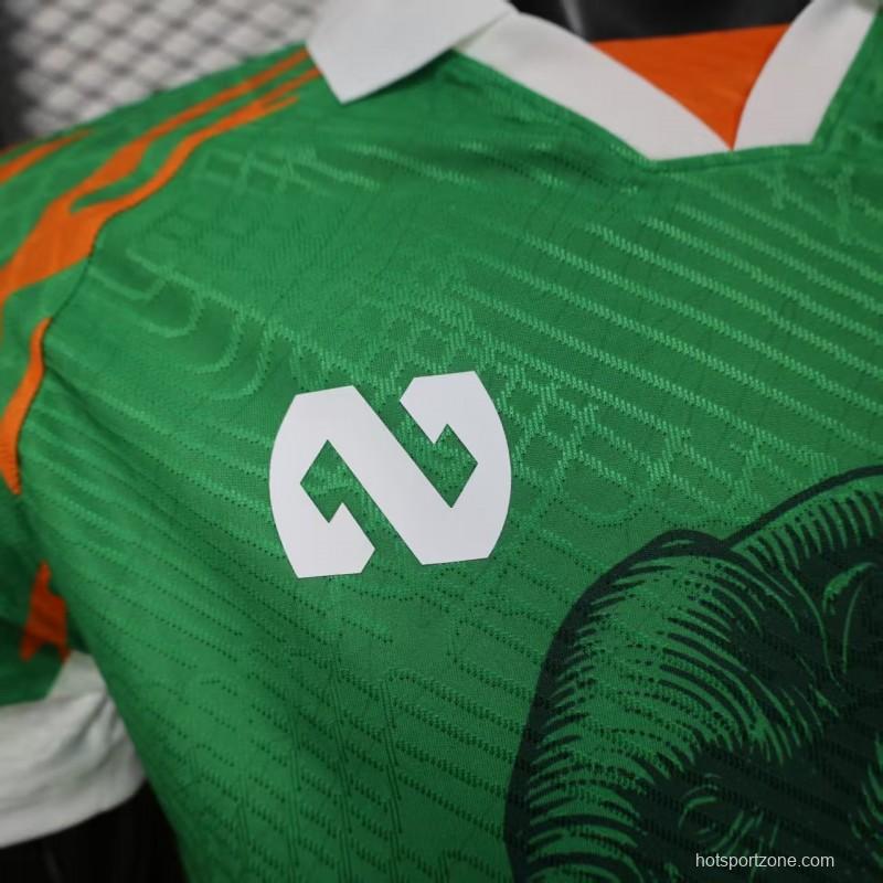 Player Version 2025 Ivory Coast Green with Elephant Graphic and Orange Trim Jersey